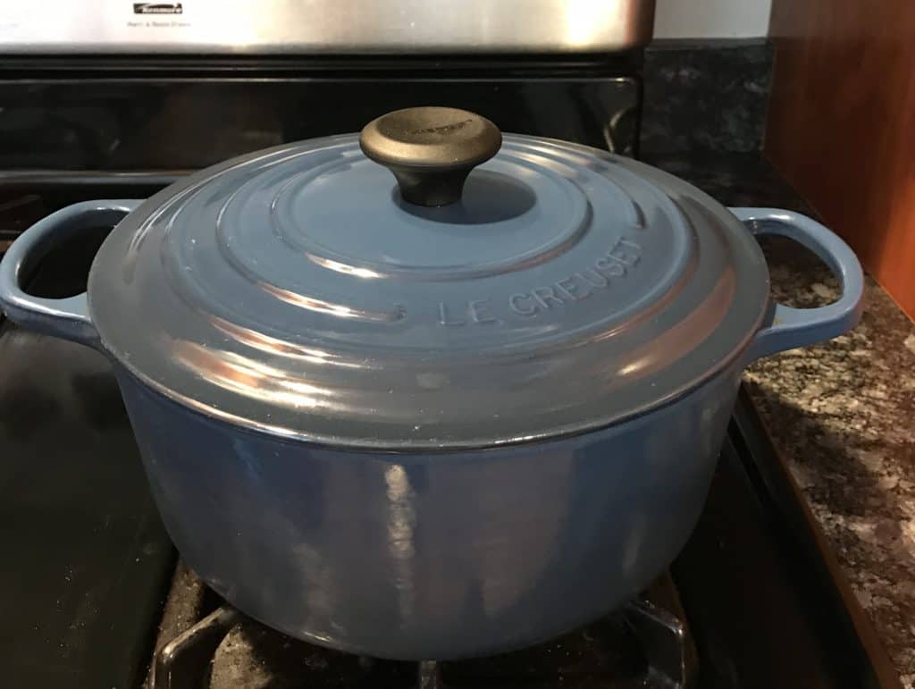 Le Creuset 5.5 quart Dutch oven on stove