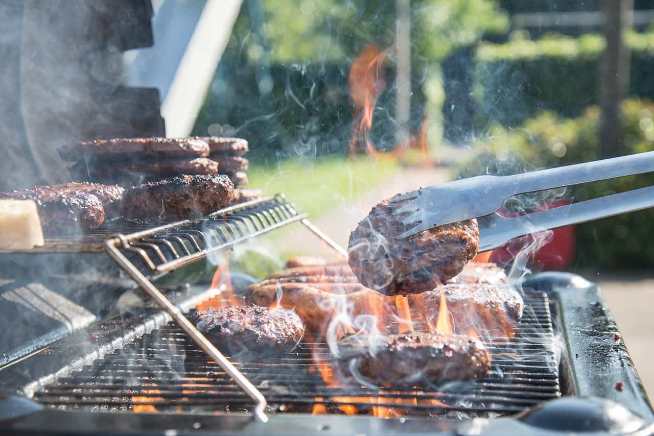cooking burgers on the grill