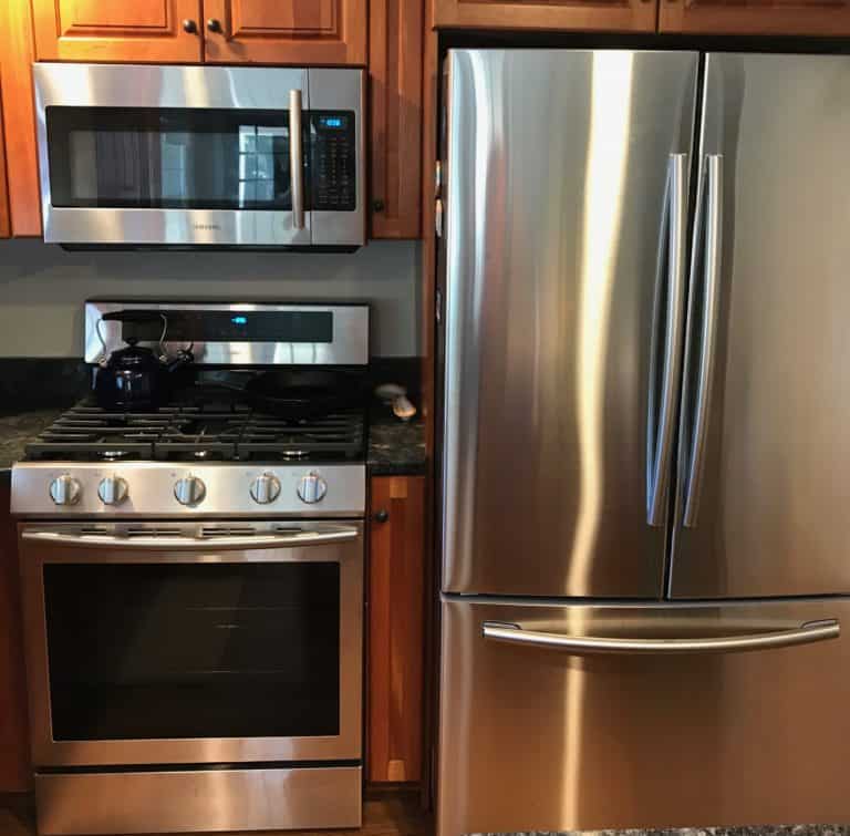 How to clean Frigidaire stainless stove steel without scratching backing