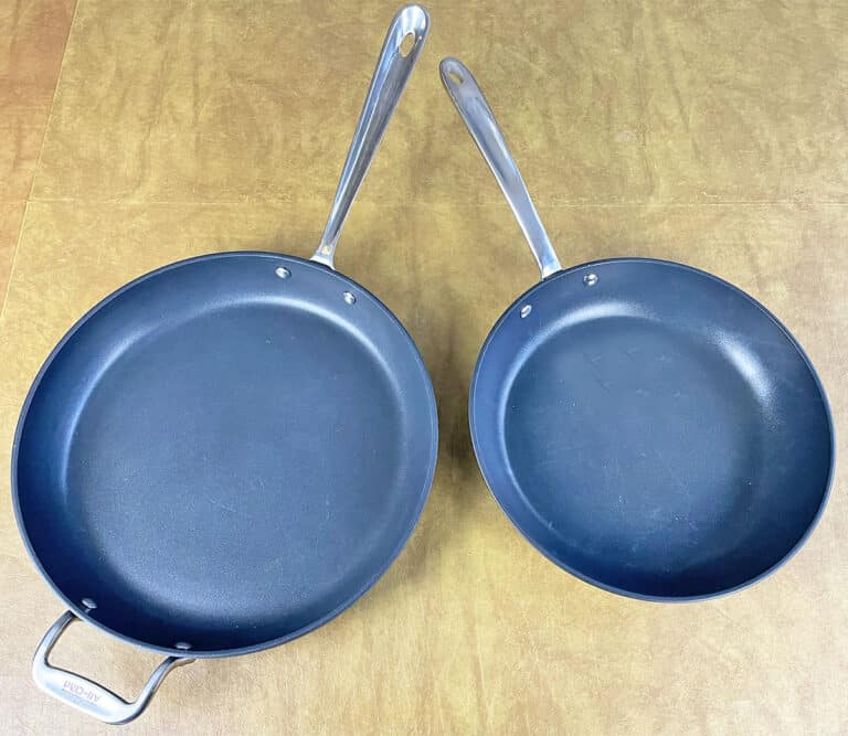 AllClad HA1 vs. Essentials 5 Key Differences Explained