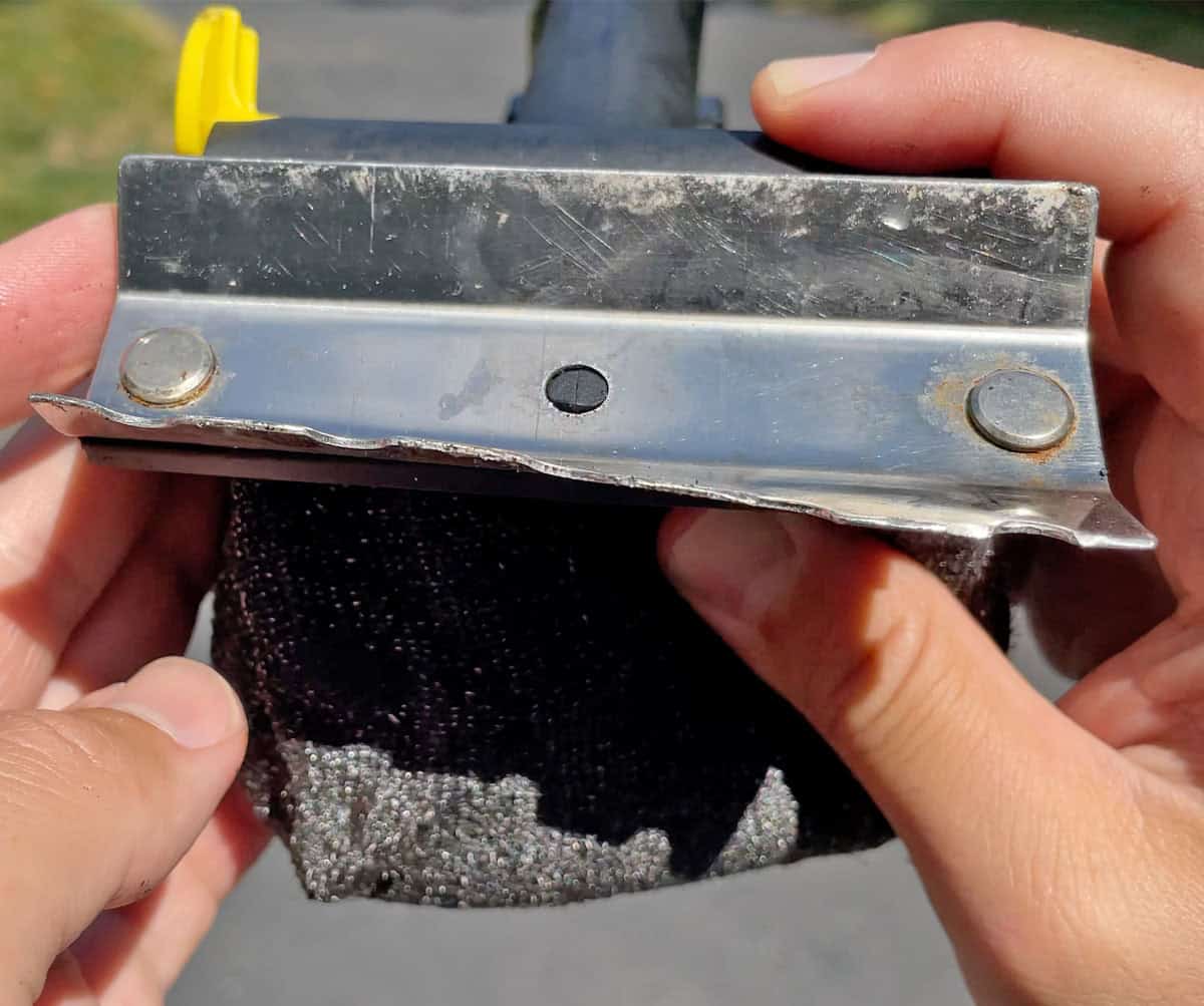 Bent scraper on BBQ Daddy after dropping it on the pavement