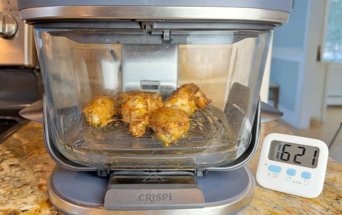 Chicken wings cooking in Ninja Crispi Pro