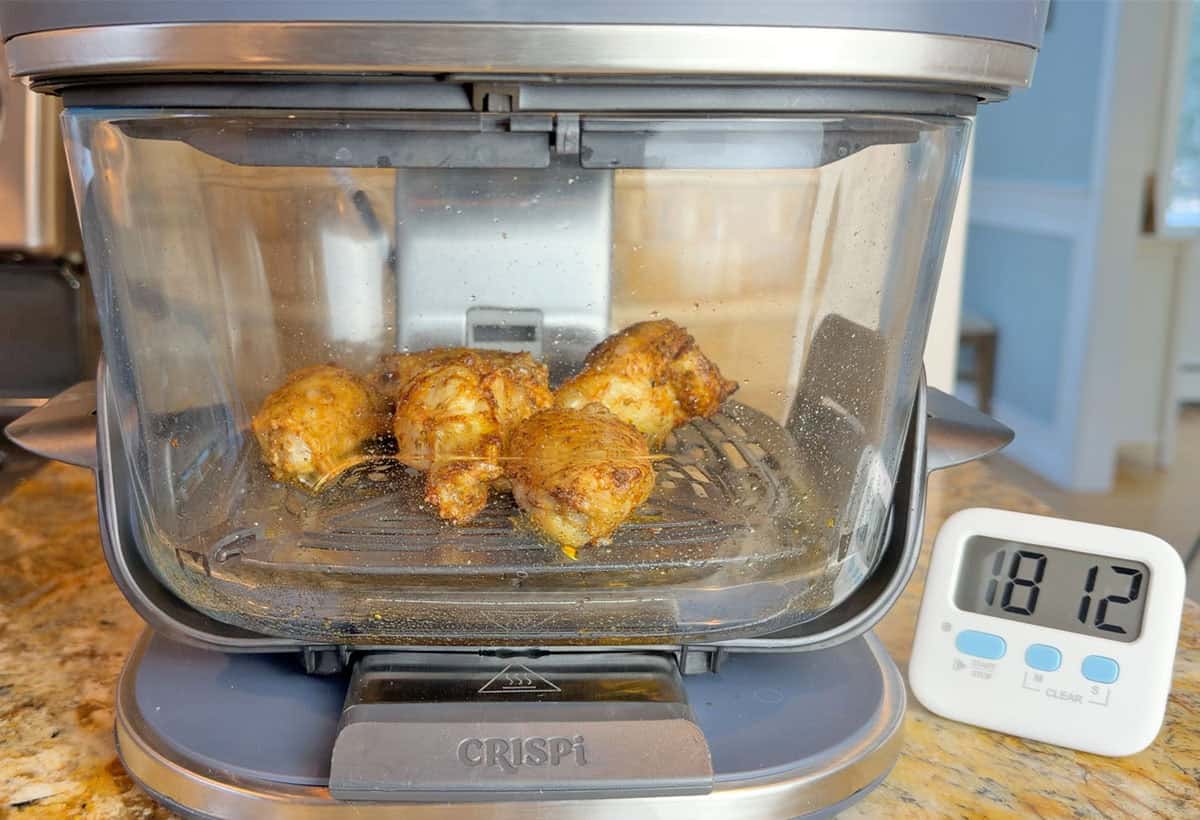 Chicken wings cooking in Ninja Crispi Pro 2