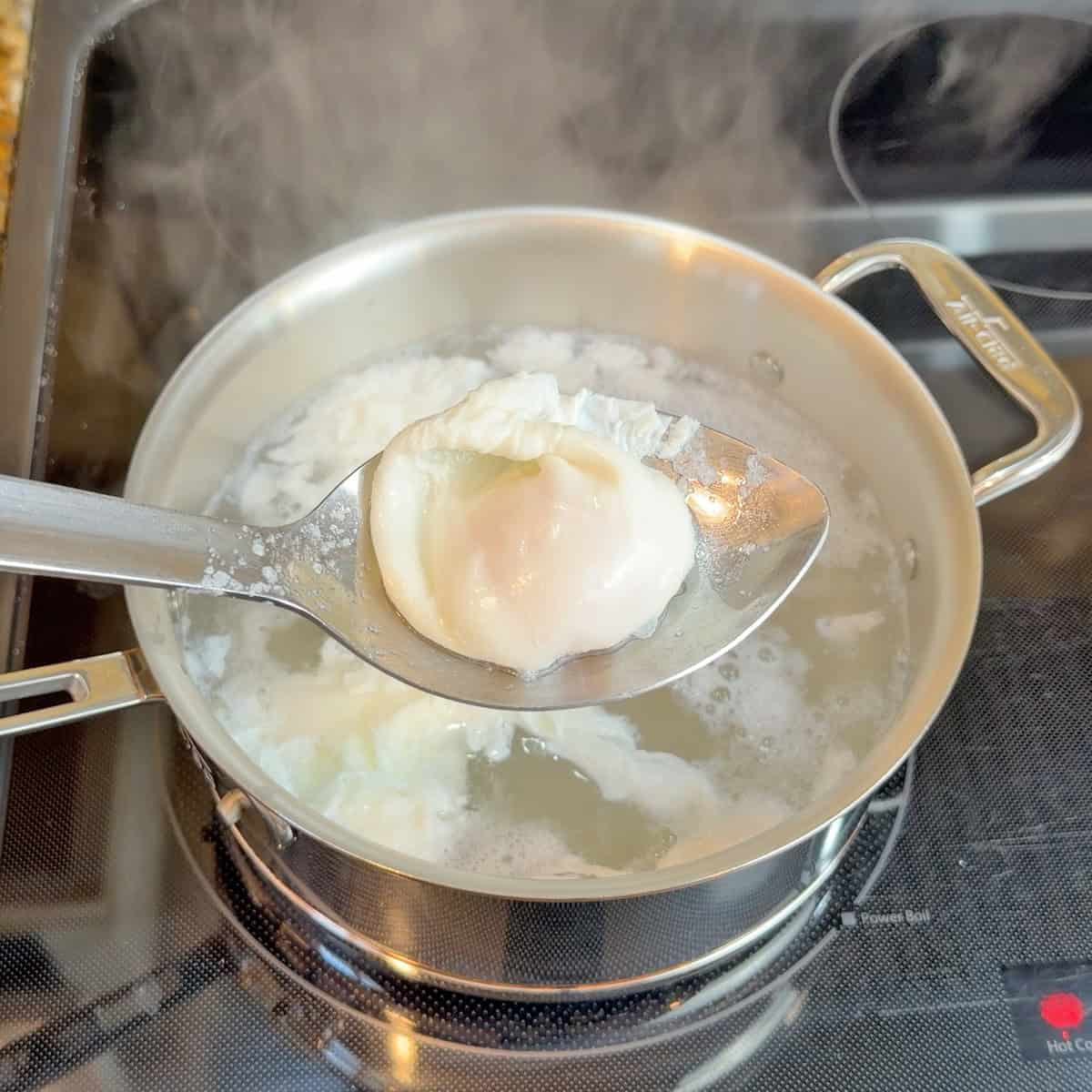 Cooking a pouched egg in All-Clad Copper Core saucepan