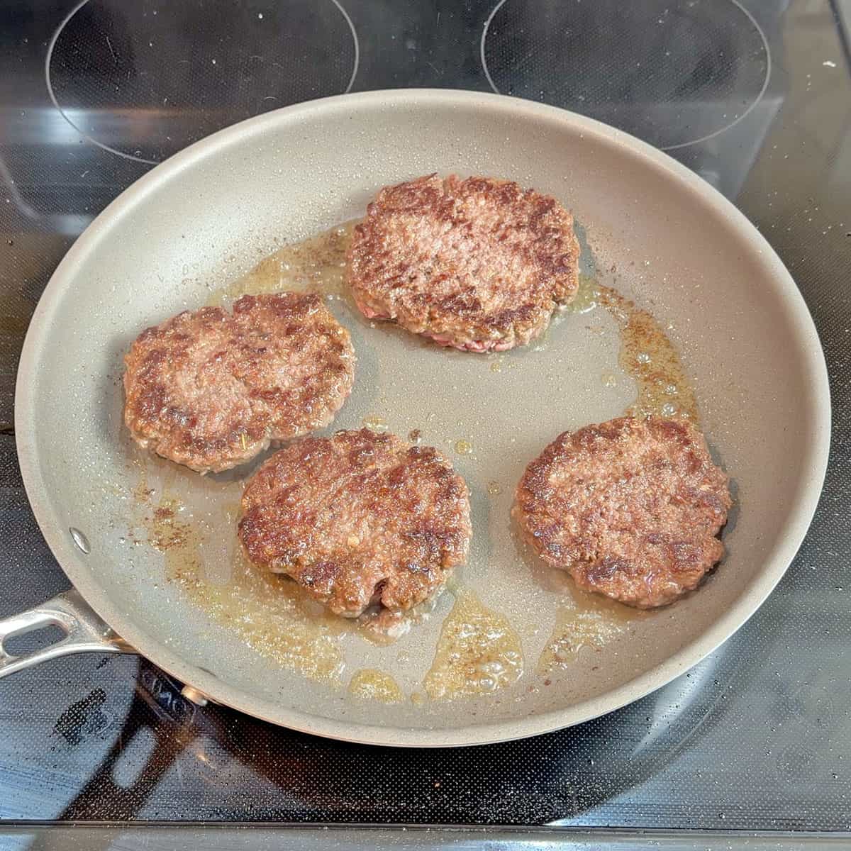 Cooking burgers in Viking PureGlide Pro