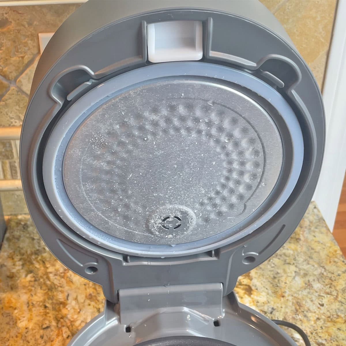 Cuckoo inner lid after self cleaning cycle still needs to be wiped