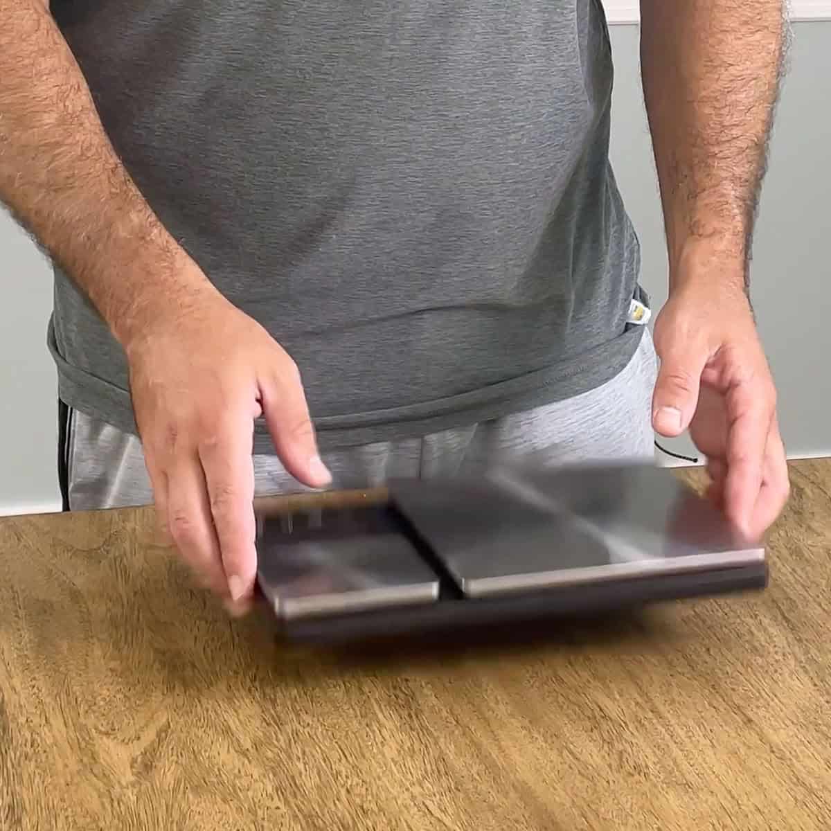 Dropping kitchen scales to test durability