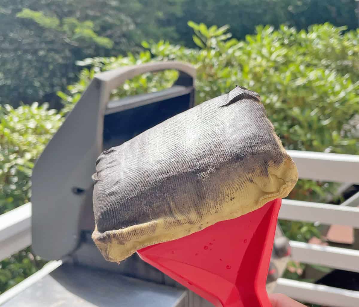 Grill Rescue sponge after 100 aggressive scrubs on a grill