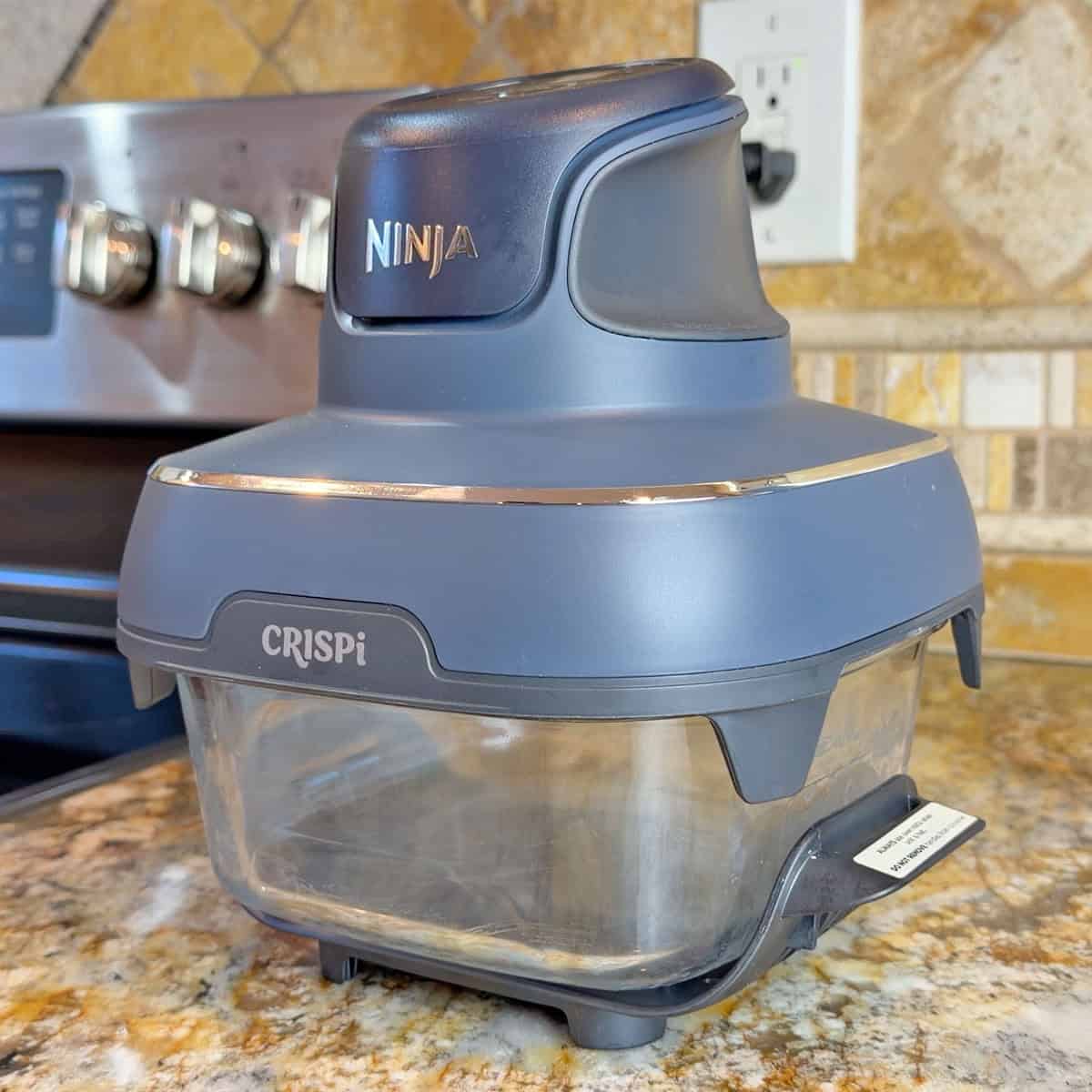 Heating Ninja Crispi after putting glass container in the freezer to test thermal shock resistance