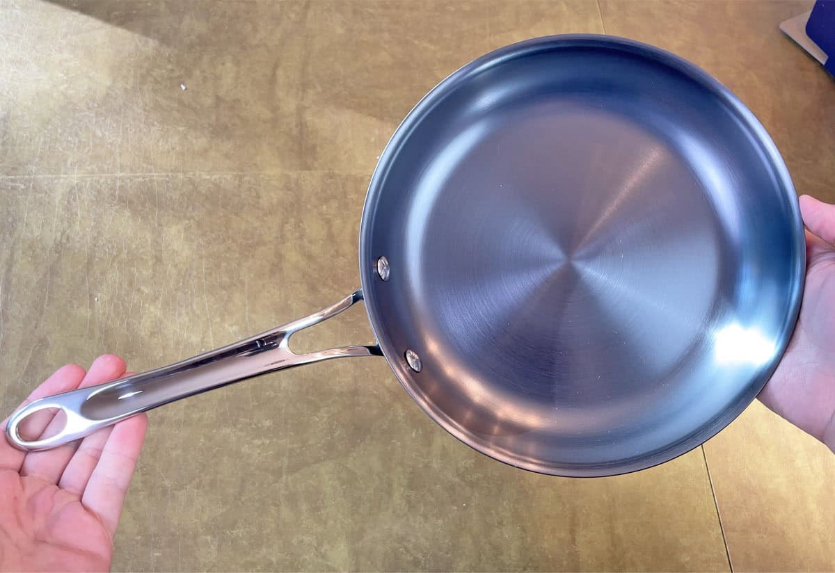 Holding Anolon EverLast N2 10 inch fry pan