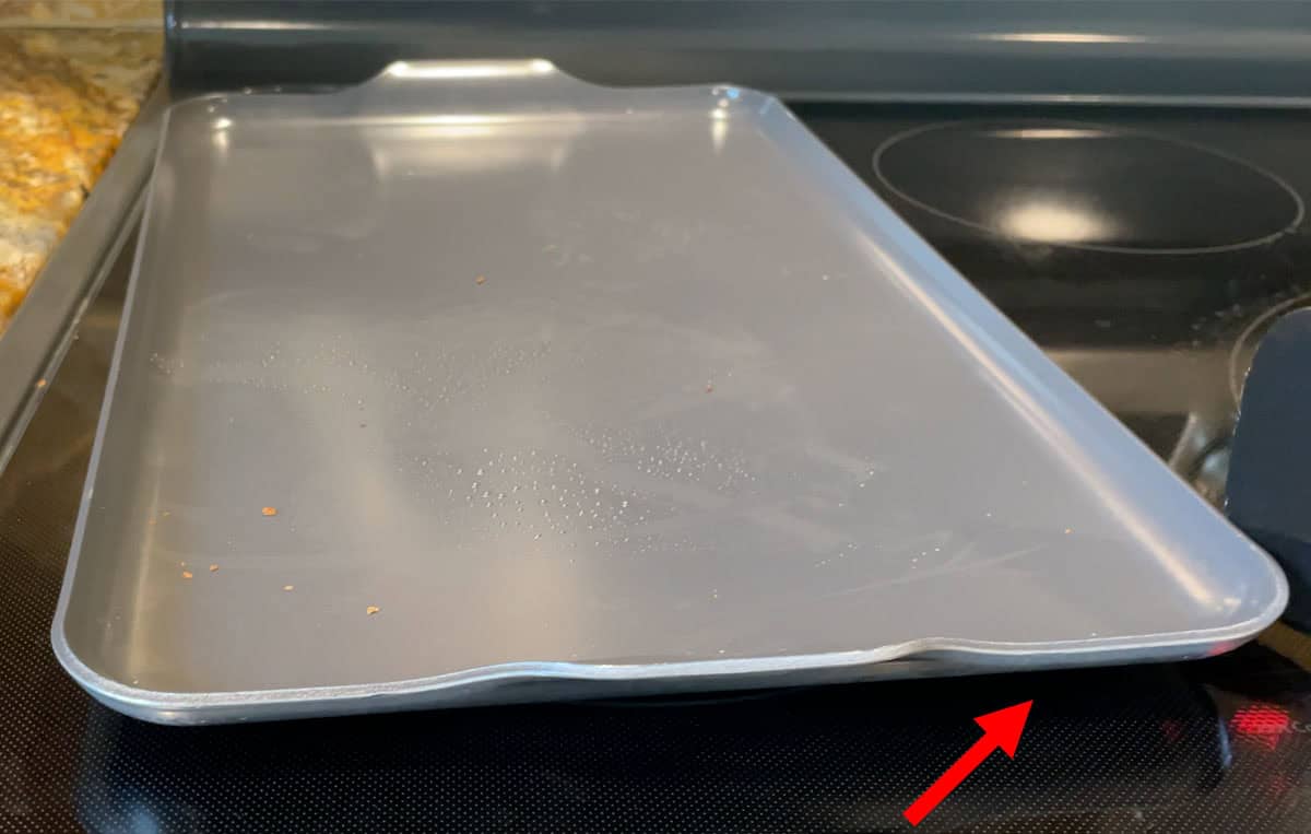 Nordic Ware two burner griddle warped and not sitting flat on cooktop