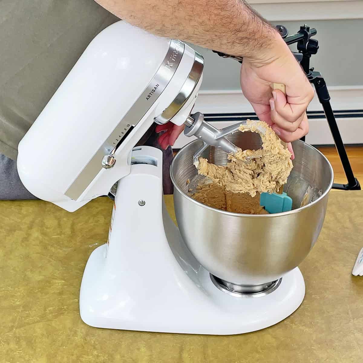 Scraping cookie dough off the sides of the KitchenAid Artisan bowl