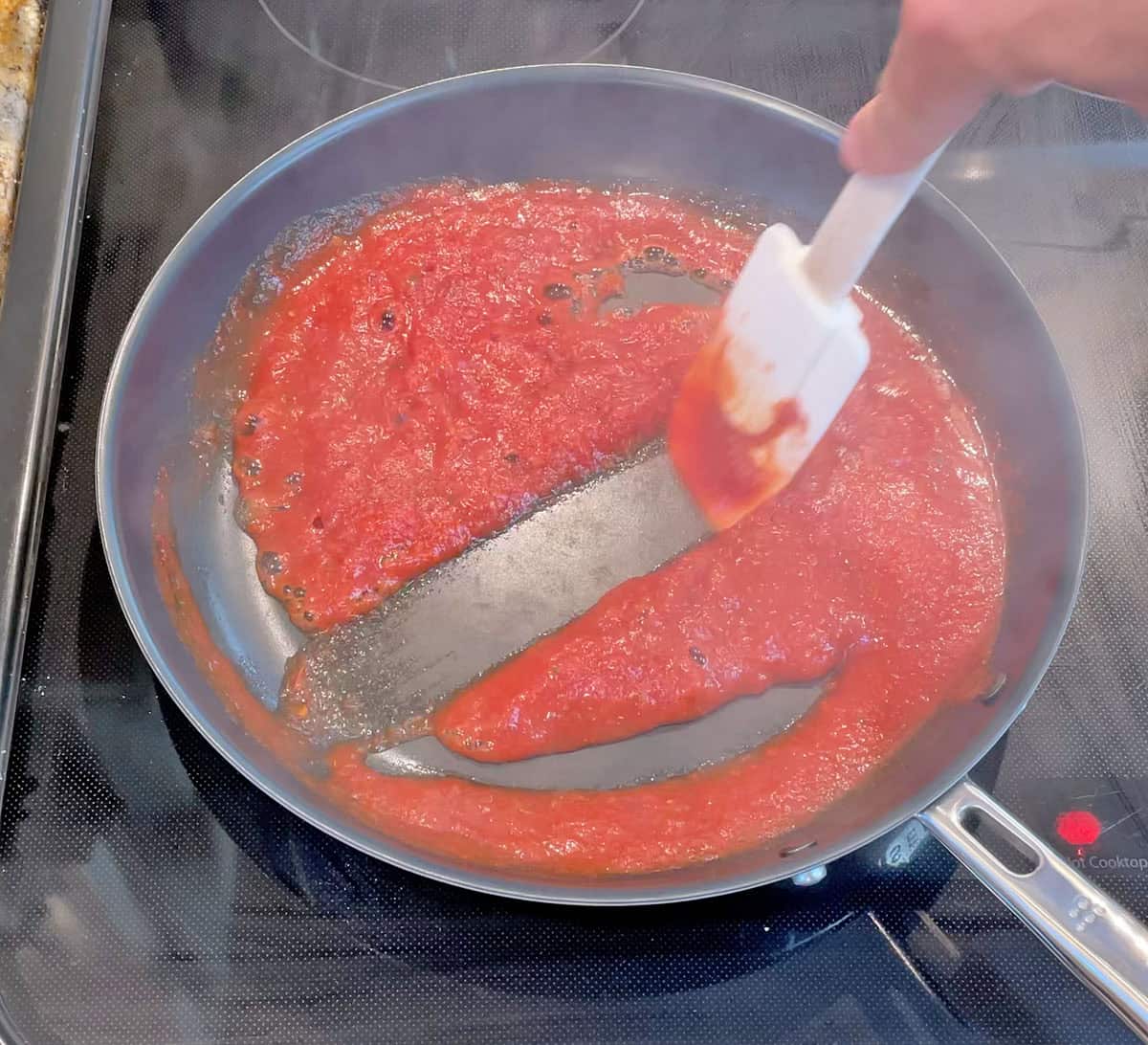 Simmering crushed tomatoes in Misen Carbon Nonstick pan