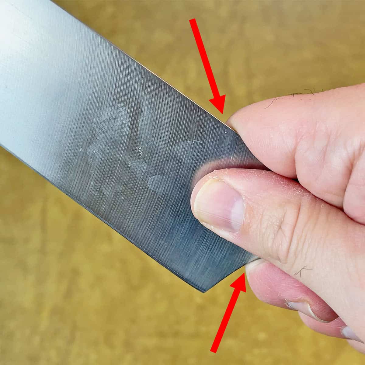 Spine and choil of knife digging into hand
