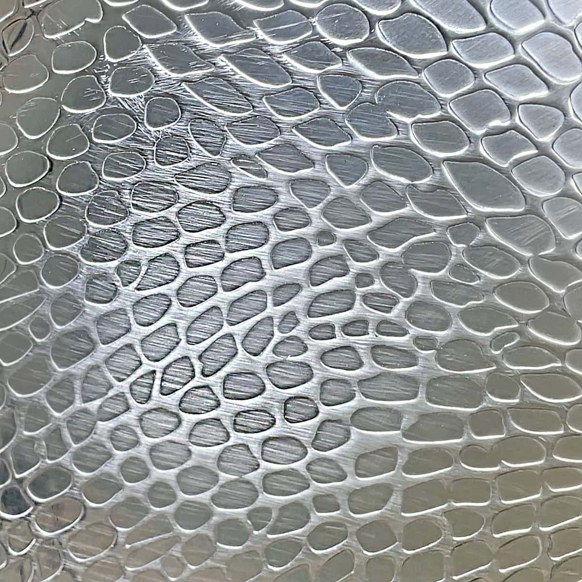 Taima Titanium scratches from rough side of a sponge