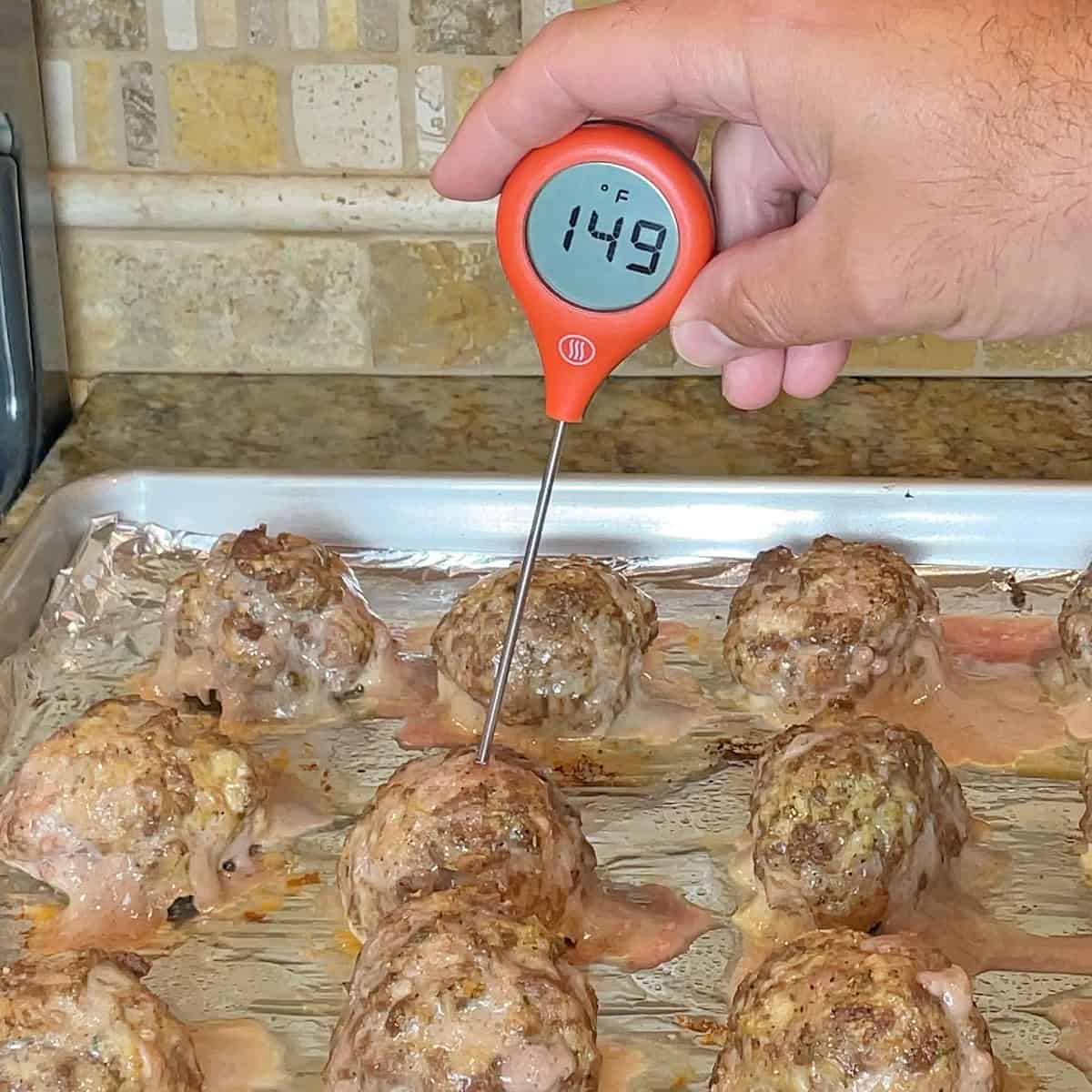 Taking the temperature of meatballs with the ThermoWorks ThermoPop 2