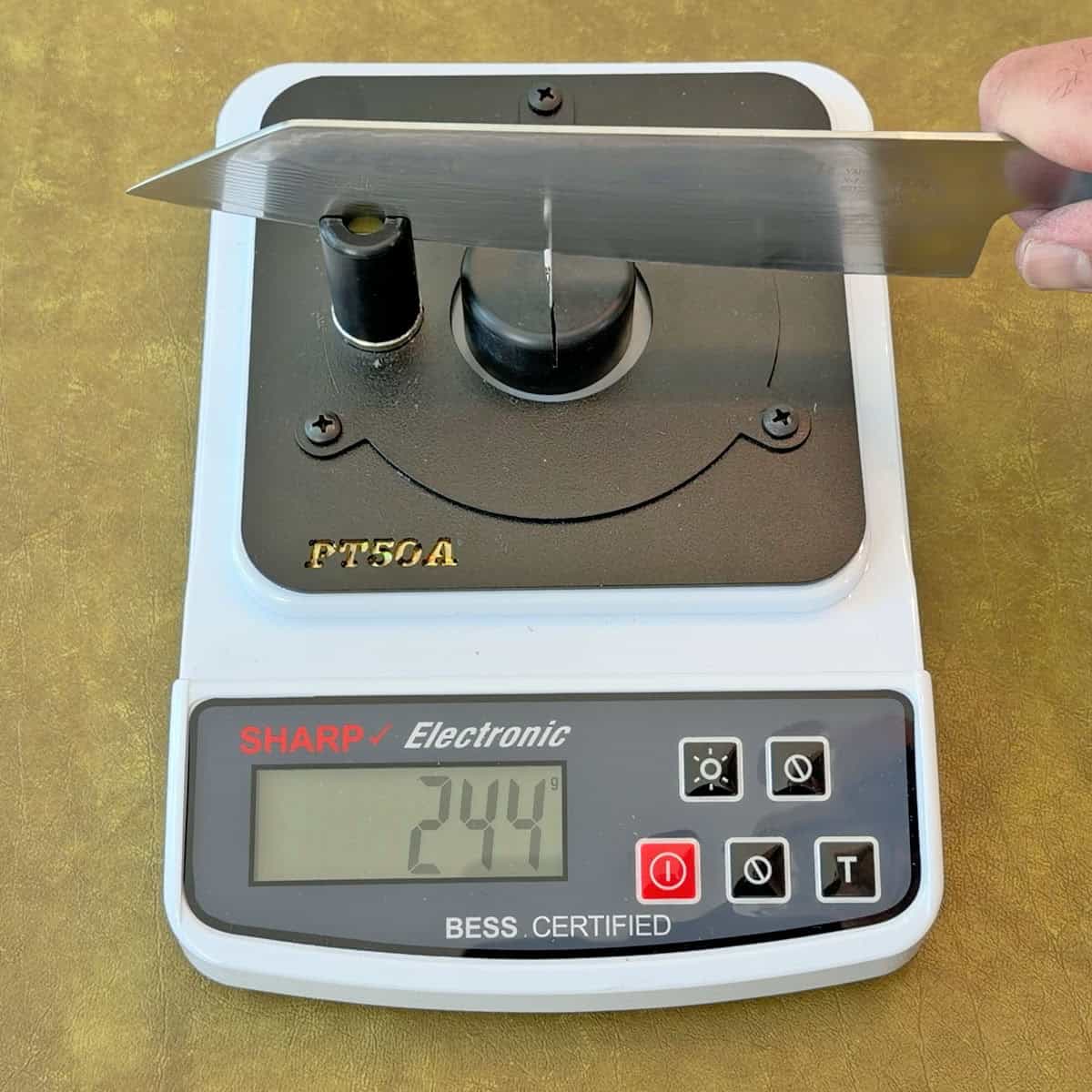 Testing sharpness of a Cangshan Yari knife after sharpening with a fixed angle sharpener twice