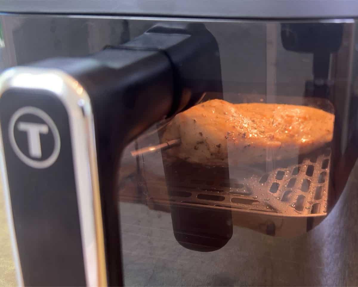 Watching chicken breast cook in the T-fal Dual Window Infrared Air Fryer