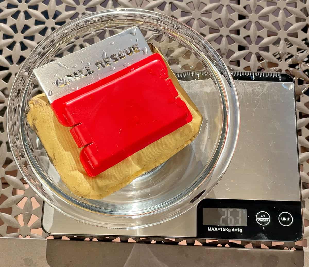 Weighing Grill Rescue sponge after soaking in water for 30 seconds